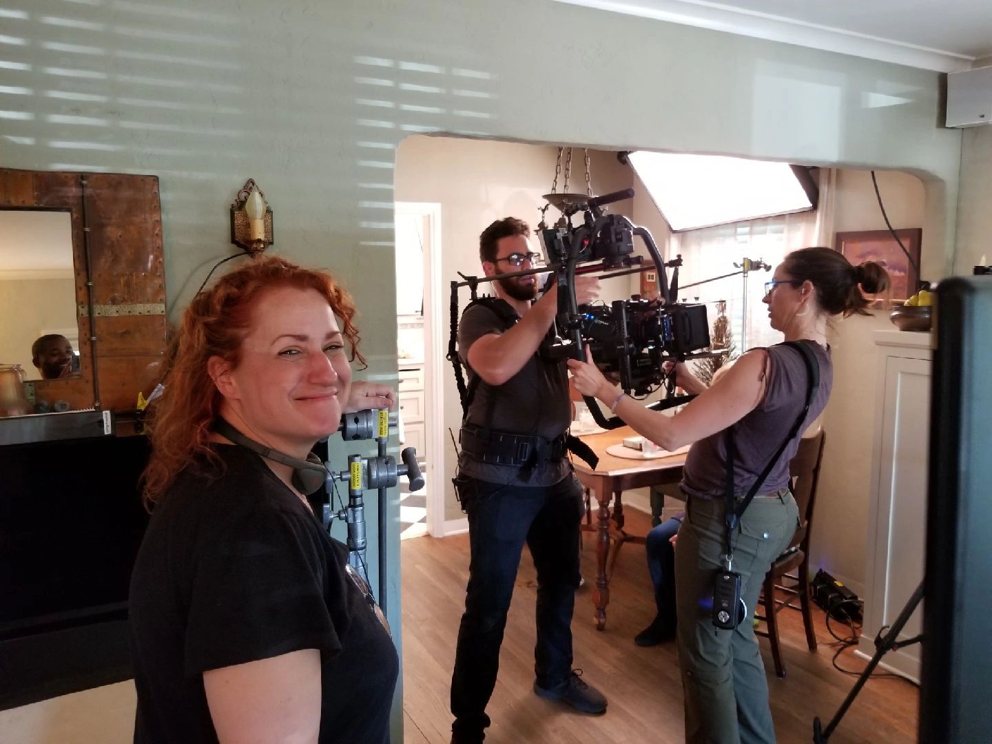 Film crew with cinema camera on set